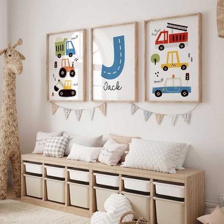 toddle boys wall art with a personalised middle print and a collection of transport vehicles including a fire truck, taxi, police car and construction vehicles