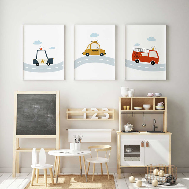 Kids transport wall art set featuring police car, taxi and fire truck prints on a road for nursery or boys bedroom decor