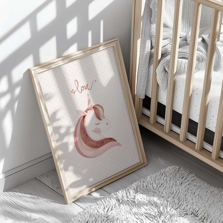 Girls unicorn print featuring a softly illustrated unicorn in blush pink tones beneath delicate handwritten love lettering