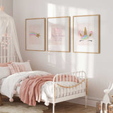 Pink unicorn wall art set of three with a rainbow shooting star, sparkle quote and pastel mane with gold-effect details.