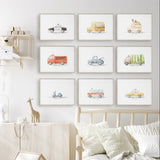 Nine watercolour vehicle prints with a bus, police car, fire engine, tow truck, rubbish truck, taxi, scooter and two vans.