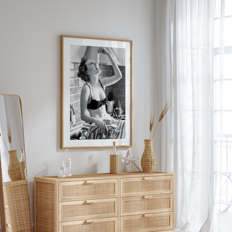 Vintage-inspired black and white food poster with a woman eating spaghetti.