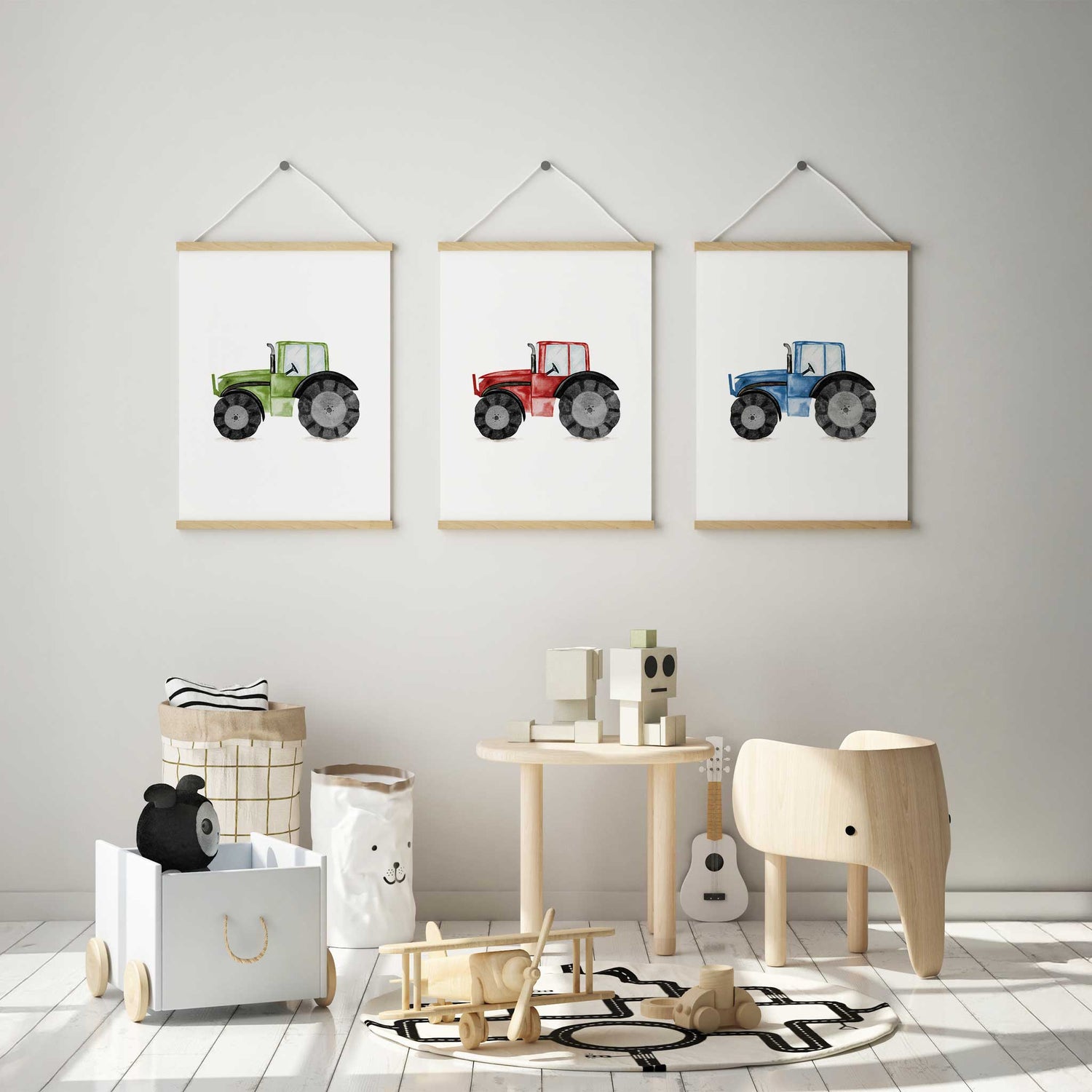 Vintage-style tractor art prints for nursery or baby room, featuring three colourful farm vehicles.