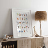 Watercolour animal ABC print with blue uppercase letters, featuring a giraffe, elephant, penguin, whale and zebra.