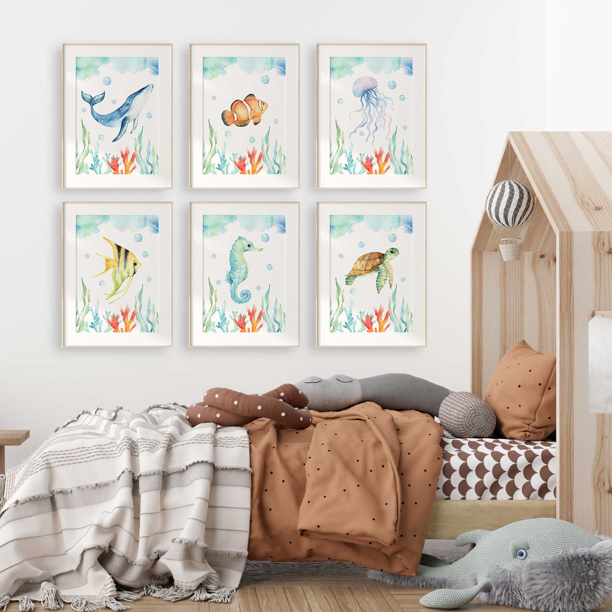 Watercolour ocean animals set in bright coastal tones