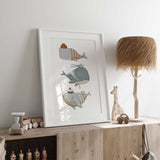 Adorable whale nursery art with three whales dressed in human-like accessories, ideal for ocean-themed baby rooms.