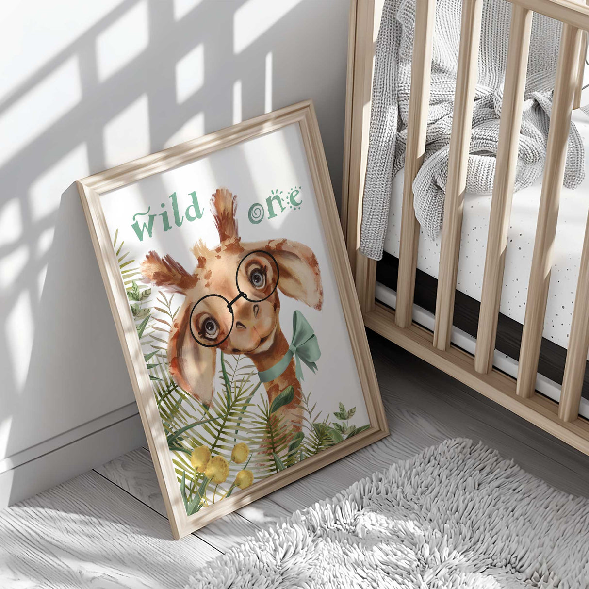 Delightful giraffe-themed wall art showcasing a stylish giraffe with glasses and a bowtie, amidst vibrant botanical details for playful nursery decor.