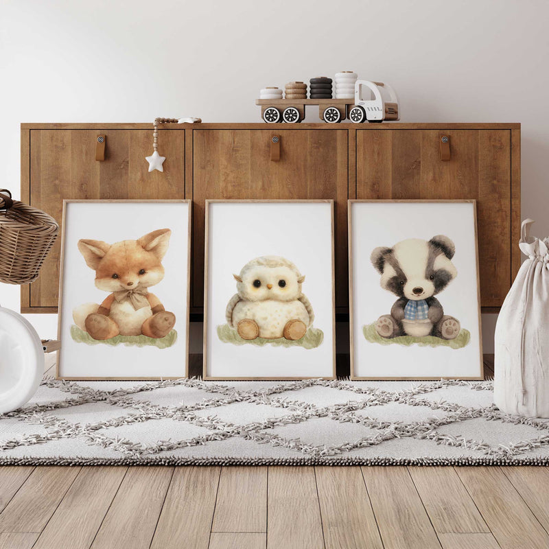 Cute fox owl and badger nursery wall art set of three prints on grass in neutral colours
