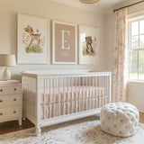 Personalised girls woodland nursery wall art set with deer, bear and custom name initial in soft neutral tones