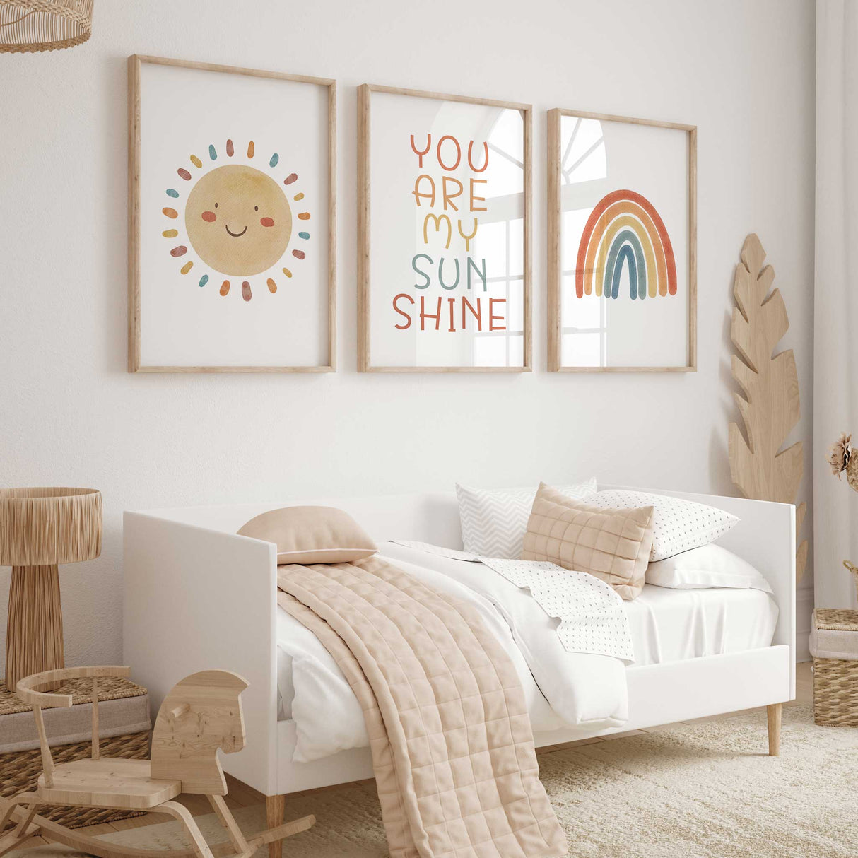 You Are My Sunshine nursery wall art set of three with a smiling sun, colourful quote and retro rainbow prints