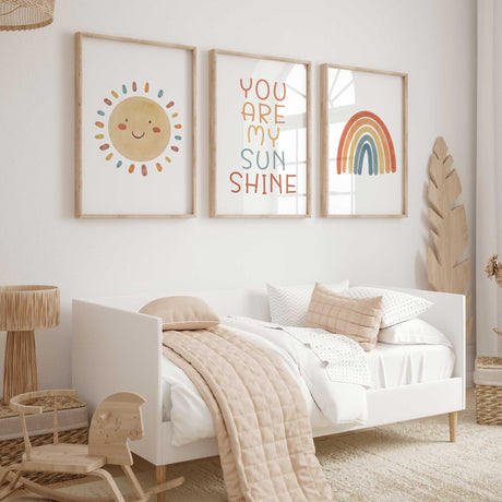 You Are My Sunshine nursery wall art set of three with a smiling sun, colourful quote and retro rainbow prints
