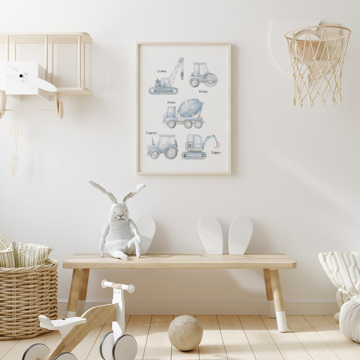 Blue construction truck nursery wall art with soft pastel vehicles, ideal for boys bedroom or playroom décor.