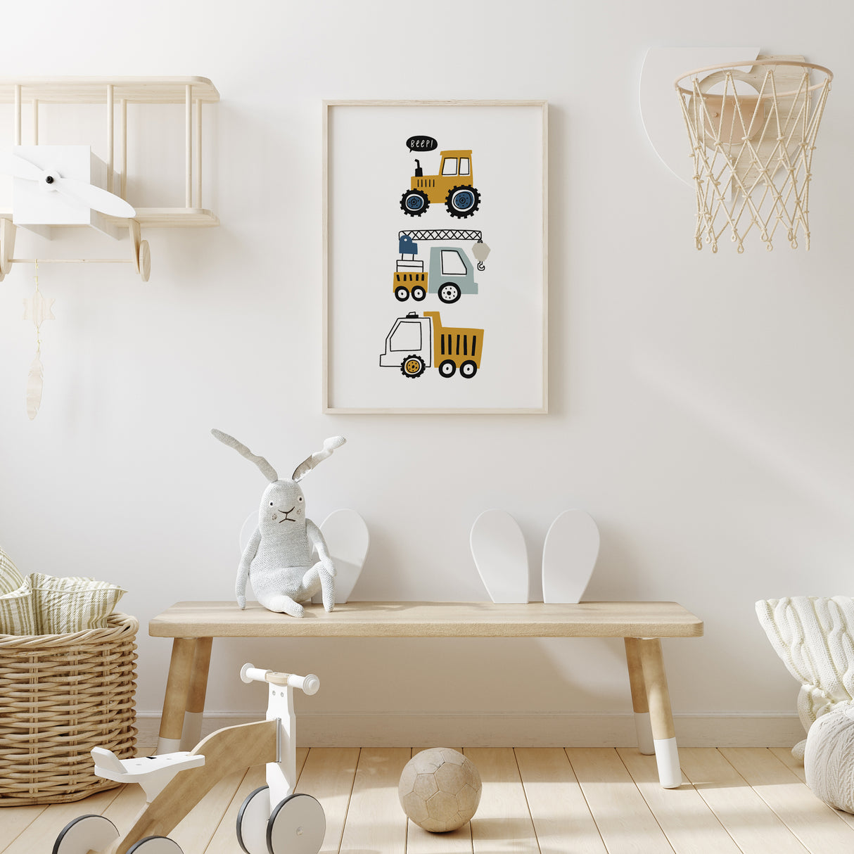 Nursery wall art featuring a yellow tractor, crane truck, and dump truck in a cartoonish style. Perfect for baby showers and nursery decor.