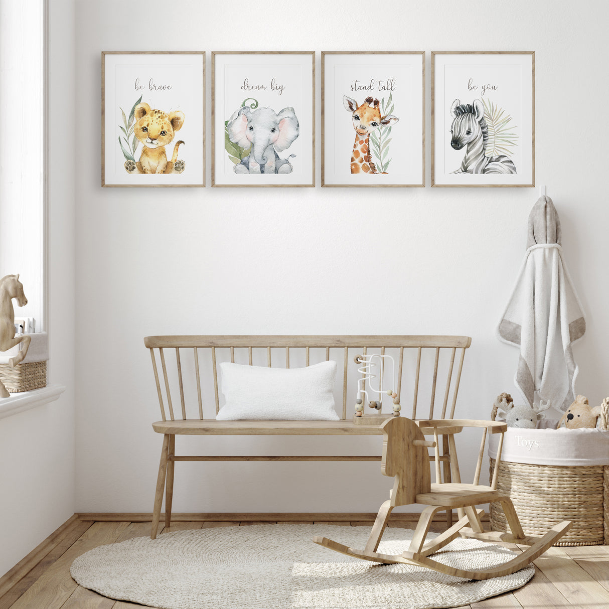 Safari baby room prints with lion cub, elephant, zebra, and giraffe illustrations in neutral tones for modern nursery walls.
