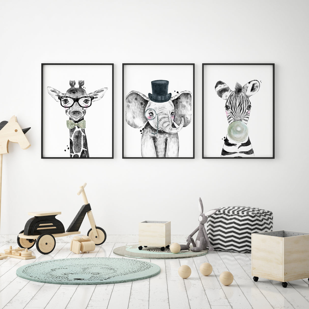playful animal illustration prints displayed together as a wall set