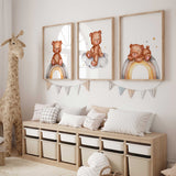 Teddy bear wall art set for baby nursery with rainbows and clouds