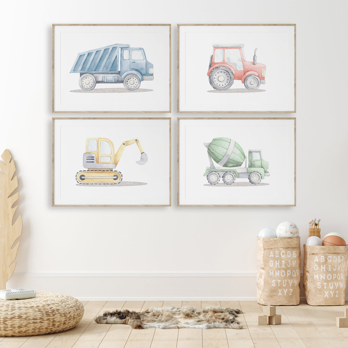 Watercolour construction vehicle set of four with a blue dump truck, red tractor, yellow digger and green cement mixer.